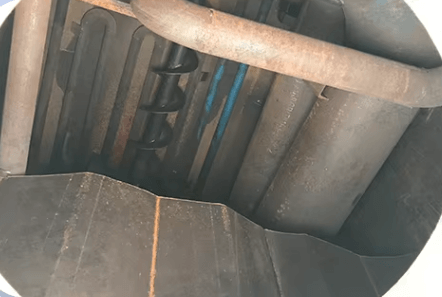 heat-conducting oil pipe and a stirrer